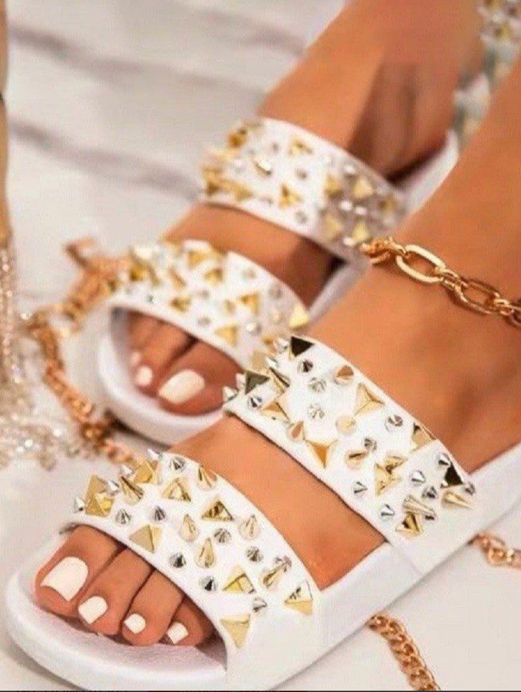 Spiked white sandals